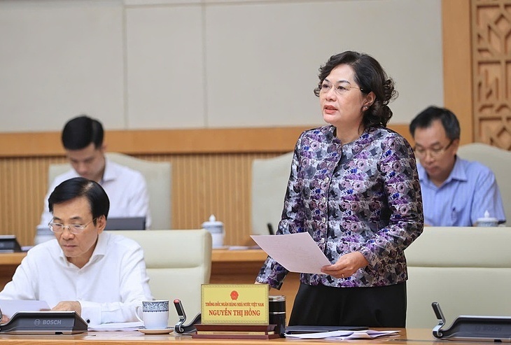 Thong doc: Chuan bi to chuc le chuyen giao hai ngan hang 0 dong hinh anh