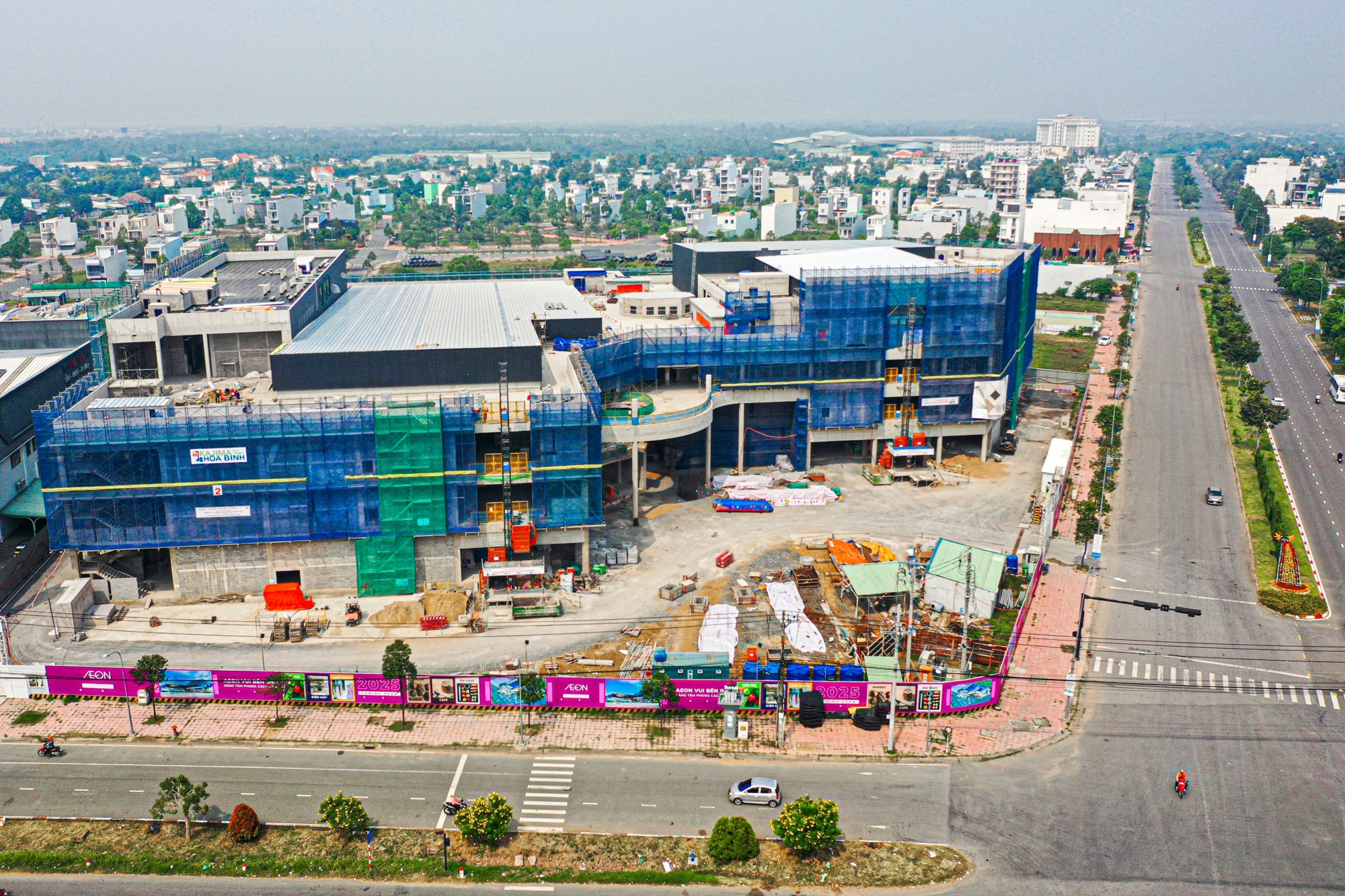 Idico ban giao gan 15.000 m2 dat cho Aeon xay TTTM dau tien o mien Tay hinh anh