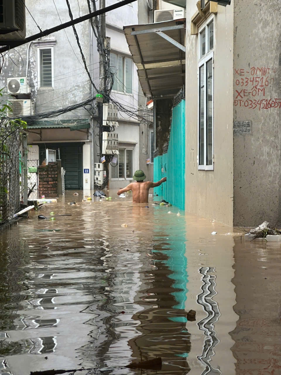 ha noi mat dien,  mat dien do ngap,  mieu nha xuan phuong anh 1