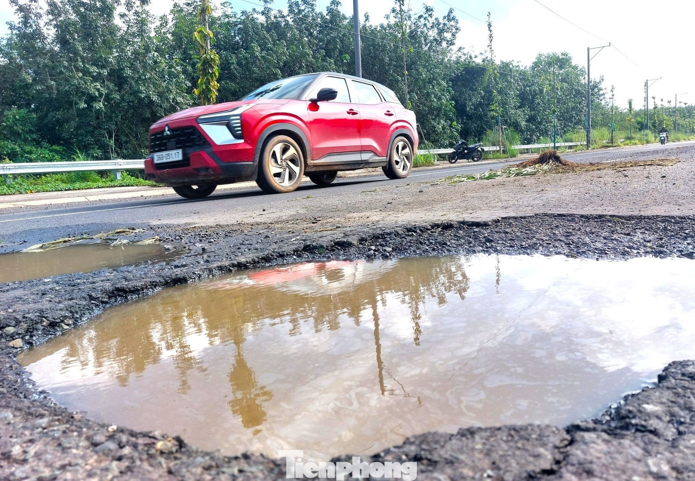 duong Bac Tan Uyen,  duong tp.hcm hong,  sua duong tp.hcm anh 3