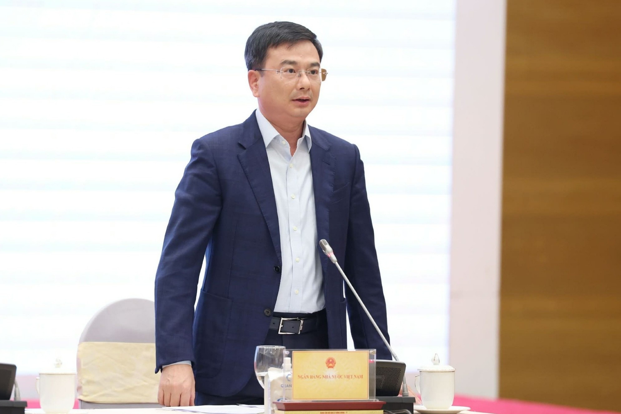 Pho thong doc NHNN tiet lo dinh huong chinh sach tien te cuoi nam hinh anh