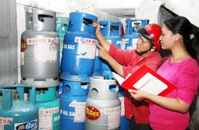 Gia gas giam 33.000 dong/binh ngay ngay dau nam 2015 hinh anh