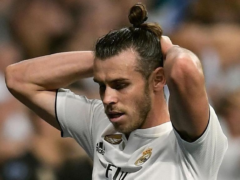 Bale co the dang trai qua chien tranh lanh voi Zidane hinh anh