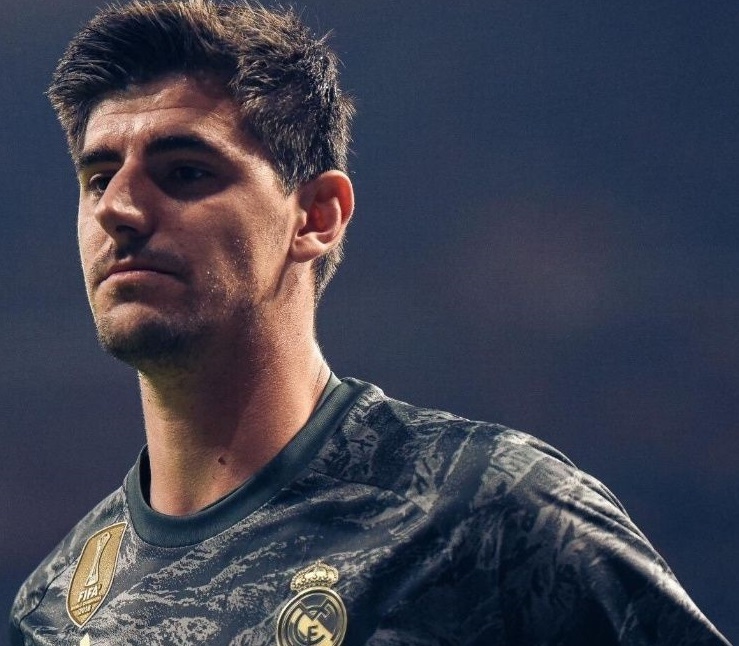 Courtois chung minh gia tri o Real Madrid hinh anh
