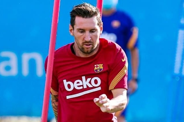Messi lan dau tap luyen sau vu doi roi Barca hinh anh