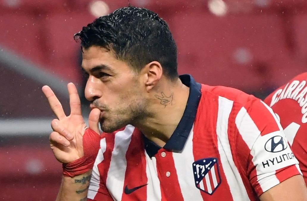 Atletico mo vo dich nho diem tua Suarez hinh anh