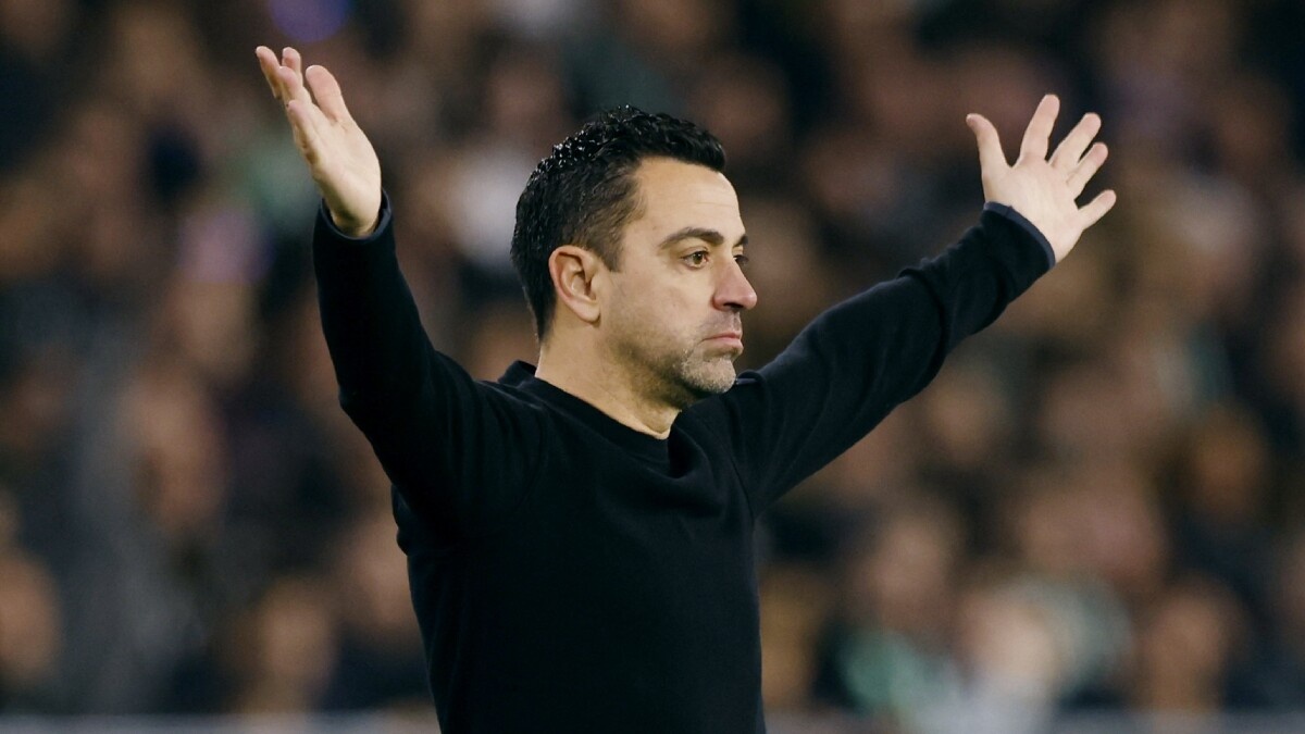 Xavi noi thang Real Madrid huong loi tu trong tai hinh anh