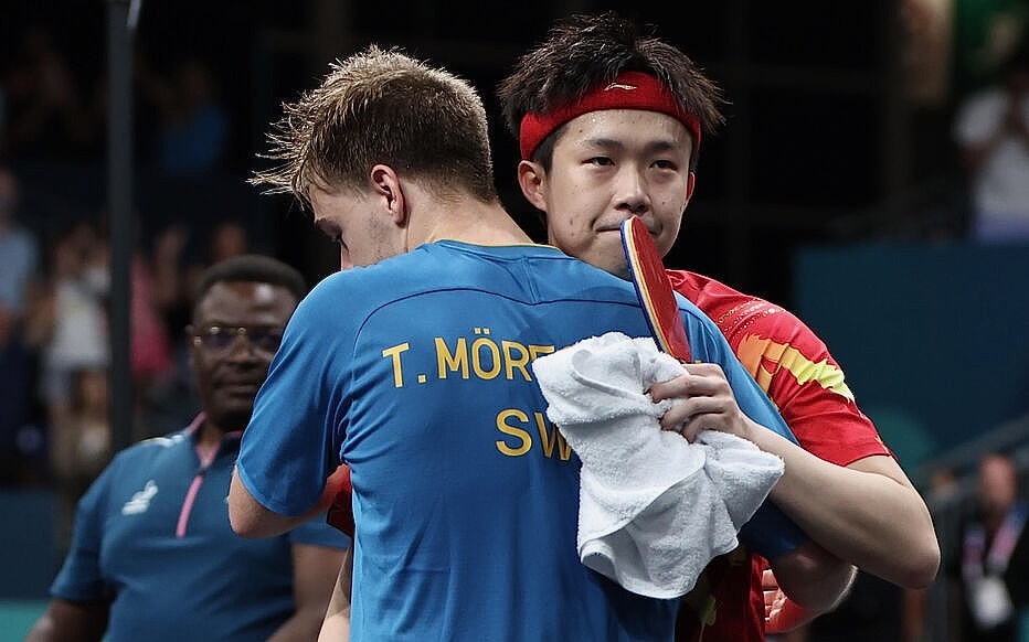 Dia chan xay ra o mon bong ban Olympic hinh anh