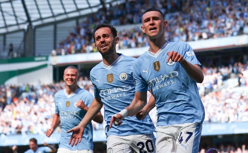 Man City vo dich Premier League lan thu 4 lien tiep hinh anh