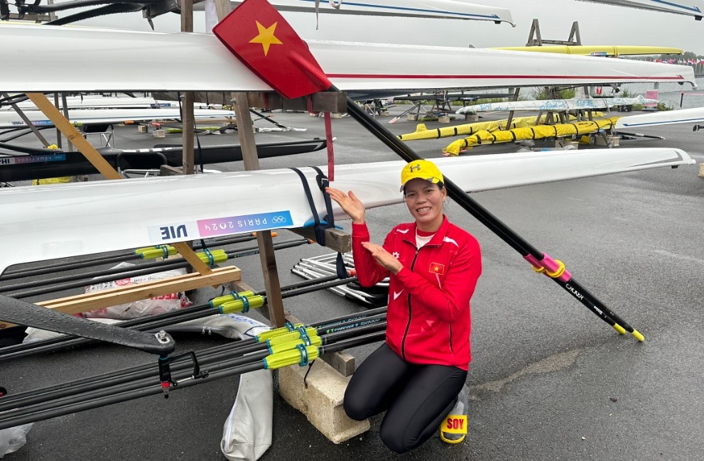 'Ba me hai con' Pham Thi Hue gay an tuong tai Olympic hinh anh