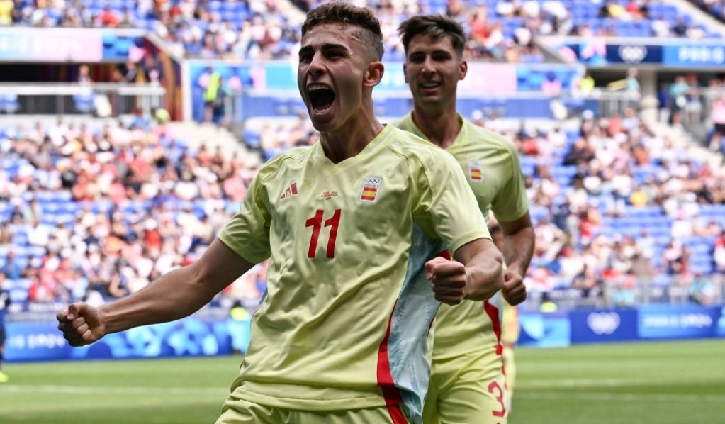 Sao Barca lap 2 sieu pham, Olympic Tay Ban Nha tien Nhat Ban ve nuoc hinh anh