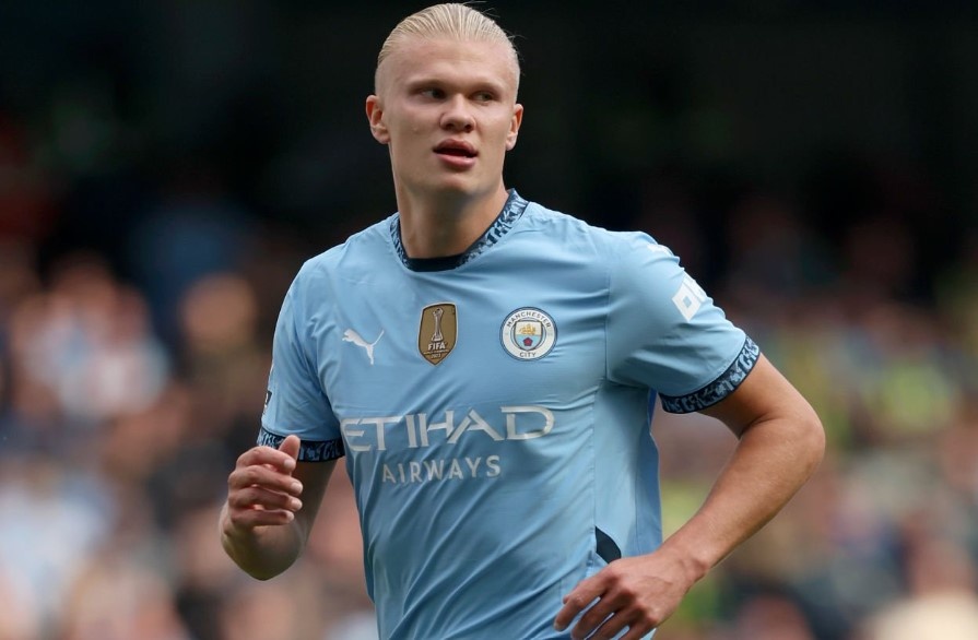 Haaland ruc sang, Man City dan dau Premier League hinh anh