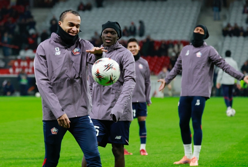 Em trai Mbappe buoc ra anh sang hinh anh