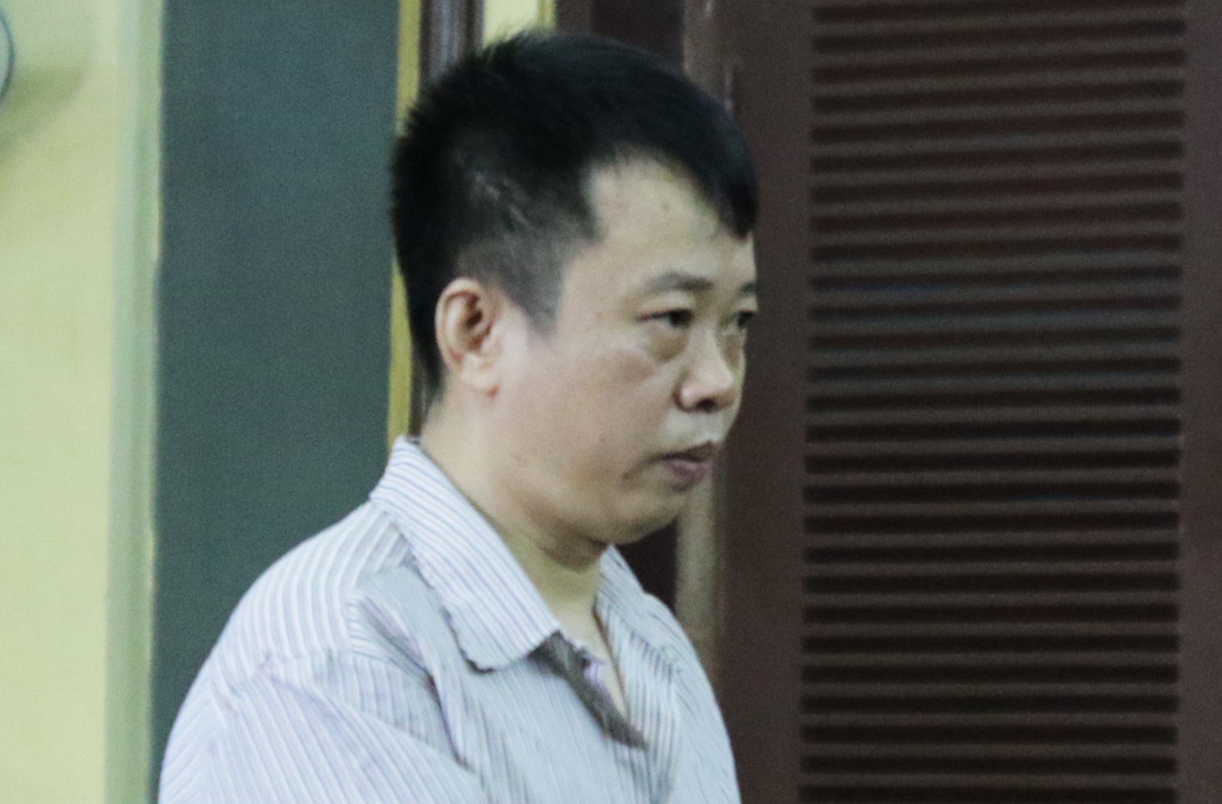 Mang an 9 nam tu sau vu dat van de nuoi 2 con chung hinh anh