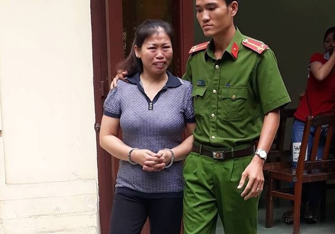 Nguoi dan ba dau doc em dau linh 10 nam tu hinh anh