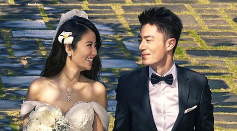 Lam Tam Nhu va Hoac Kien Hoa nam tay tren pho hinh anh