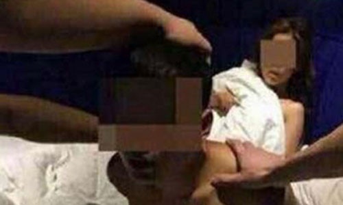 Quan ly lo clip ngoai tinh voi vo tai tu Trung Quoc bi bat hinh anh