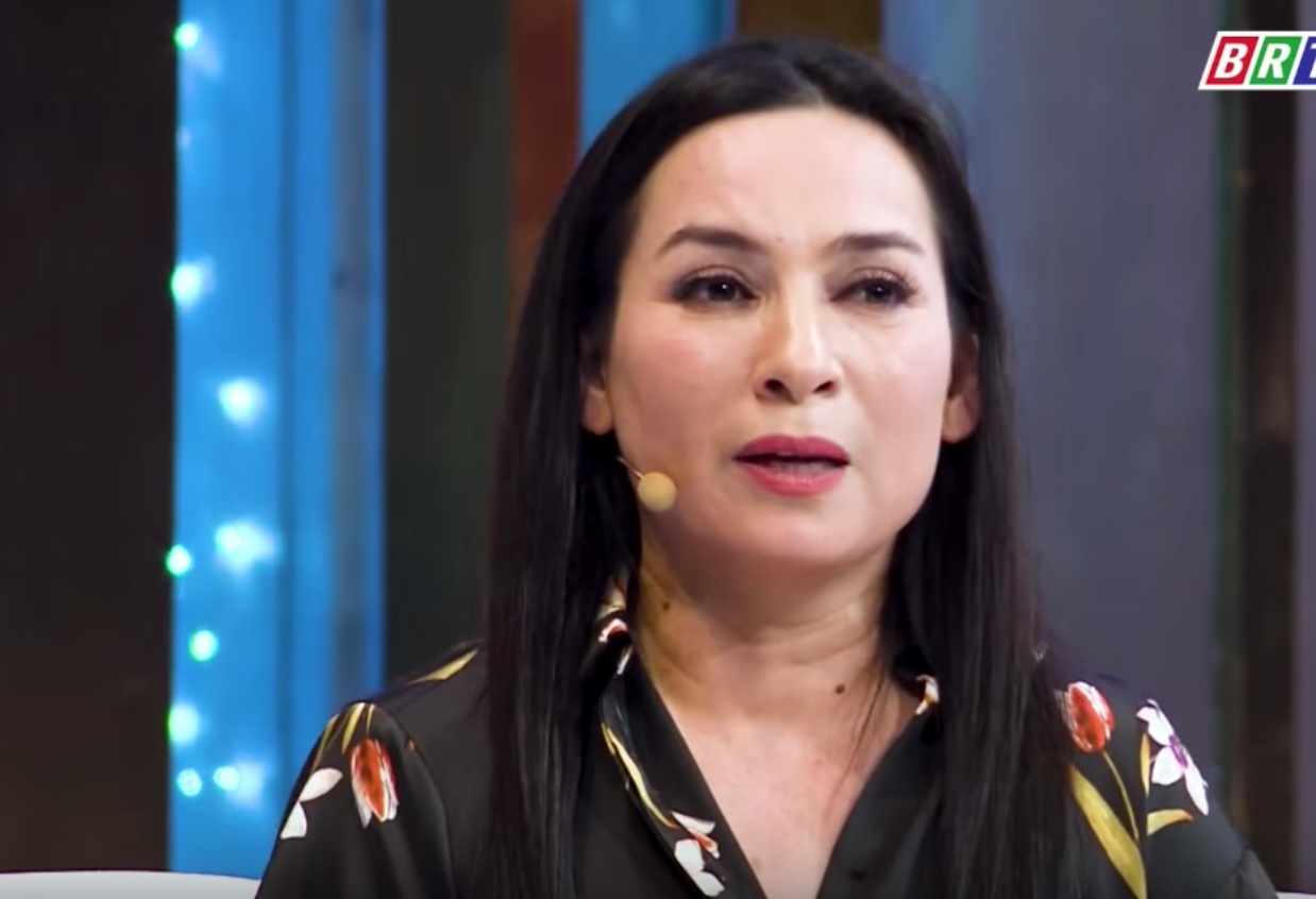 Phi Nhung ke khong cuoi chong vi nuoi 23 nguoi con hinh anh