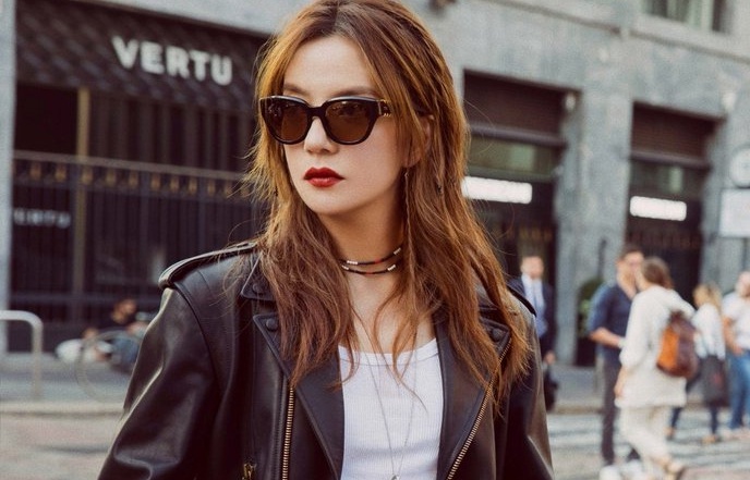 Trieu Vy o tuoi 42 tre dep hon sau khi giam 15 kg hinh anh