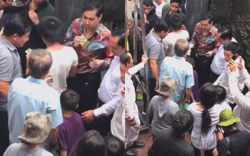 Ca sĩ Ngọc Sơn phát gạo ảnh 2 Ca si Ngoc Son phat gao anh 2