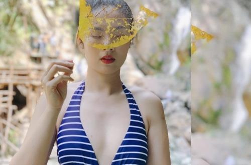 Hoa hau Ngoc Han lan hiem hoi dien bikini sau 9 nam dang quang hinh anh