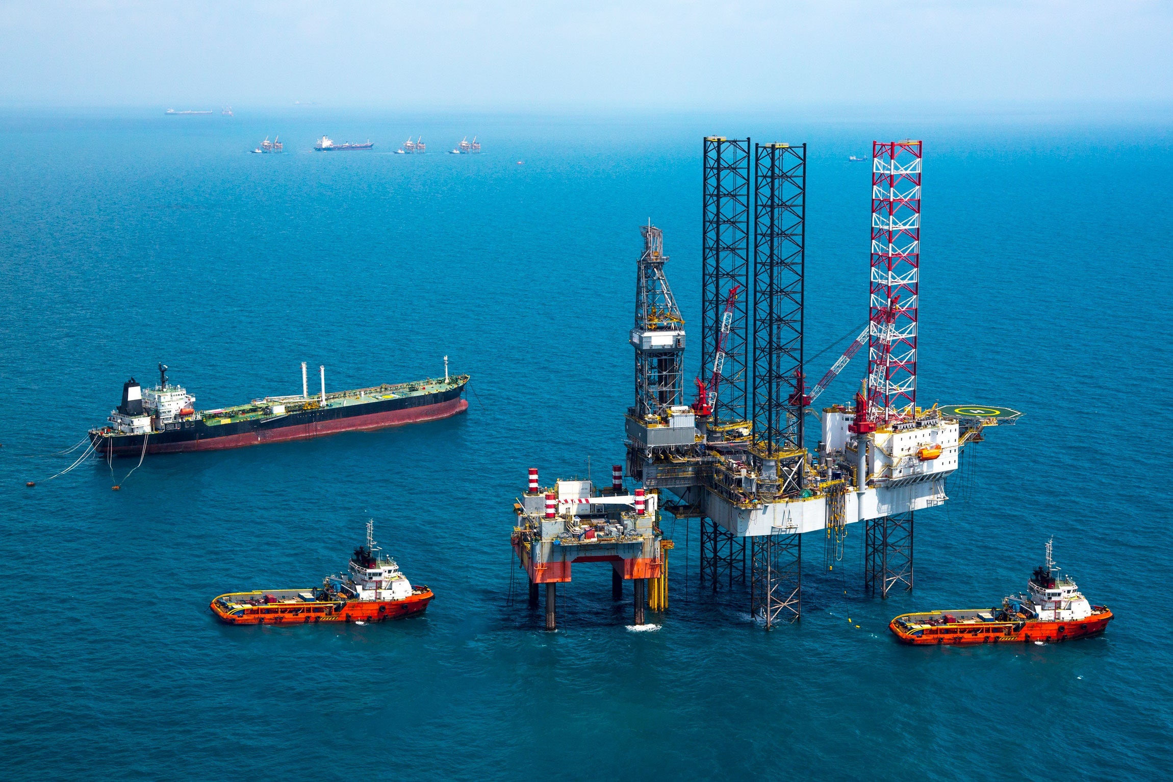 Ly do cac mo dau kho dong du the gioi dang thua hinh anh