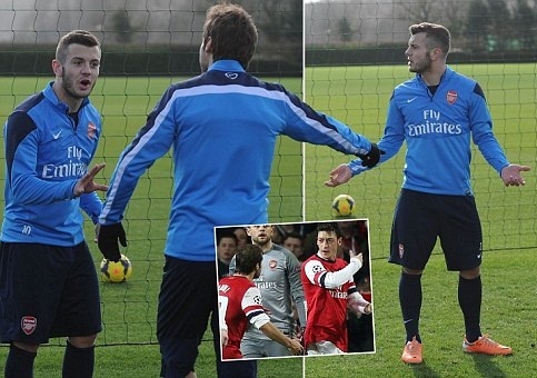 Wilshere va Flamini suyt choang nhau tren san tap hinh anh