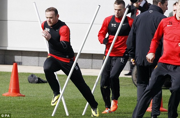 HLV Guardiola khẳng định Rooney sẽ đá trận gặp Bayern. Ảnh Getty Images