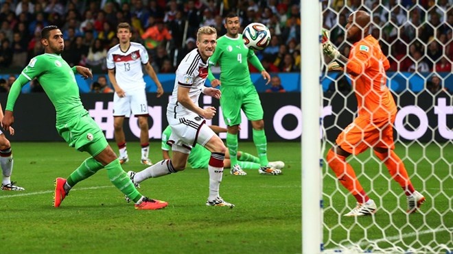 ĐT Đức đánh bại Algeria 2-1 trong hiệp phụ nhờ bàn thắng tuyệt đẹp của Schurrle và Mesut Ozil. Ảnh: AP. 