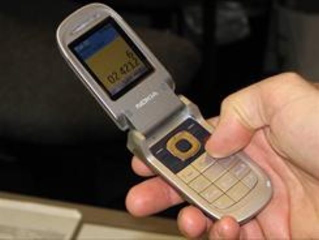 Darren Kersey trải qua một đêm trong phòng tạm giam vì sạc điện thoại. Ảnh: UPI