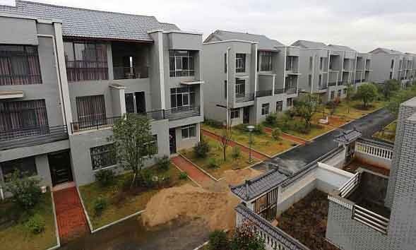 Trieu phu TQ xay biet thu, can ho mien phi cho ca lang hinh anh