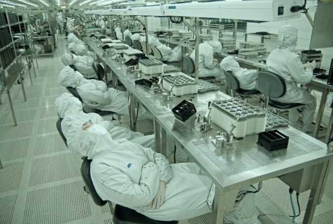 Cuoc song vat va cua nguoi lao dong nhap cu Trung Quoc hinh anh