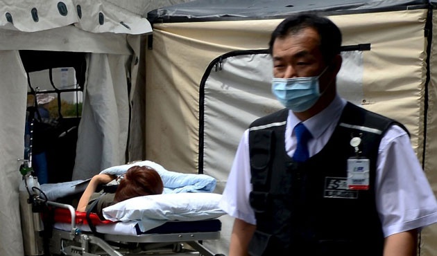 Han Quoc dong cua 1.800 truong hoc do lo ngai MERS hinh anh