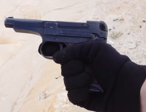 Canh tuong ban sung Nambu Type 94 ma khong siet co hinh anh