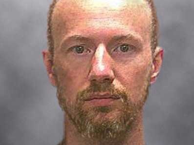 Ngay dau tro ve phong giam cua sat thu vuot nguc My hinh anh