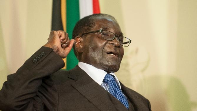 Tong thong Zimbabwe nhan giai hoa binh gay tranh cai cua TQ hinh anh