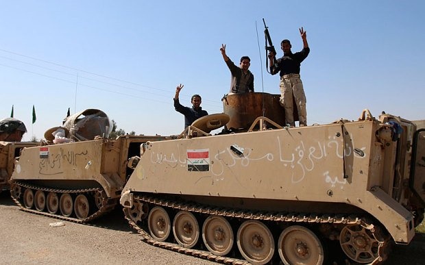 IS huong loi tu hoat dong buon ban vu khi tai Iraq hinh anh