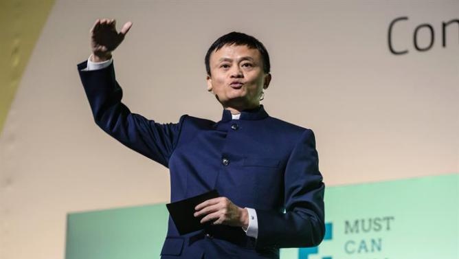 Tham vong cua Alibaba qua viec mua bao SCMP hinh anh
