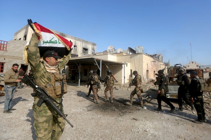 Quan doi Iraq bat thu linh tai chinh cua IS hinh anh