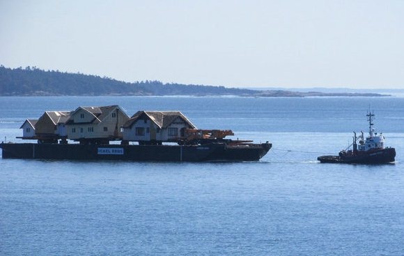 Du an dua nhung ngoi nha vuot bien tu Canada toi My hinh anh