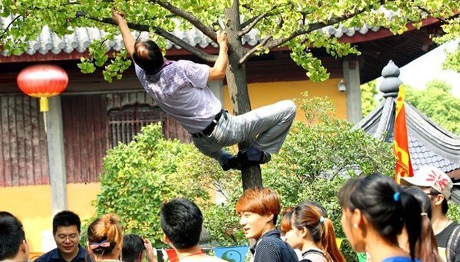 Trung Quoc muon dan lam khach du lich van minh hinh anh