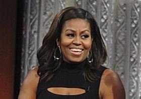 Ba Obama 'nhai giong' chong tren truyen hinh hinh anh