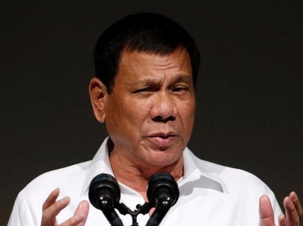 Tong thong Philippines huy hop dong mua sung voi My hinh anh