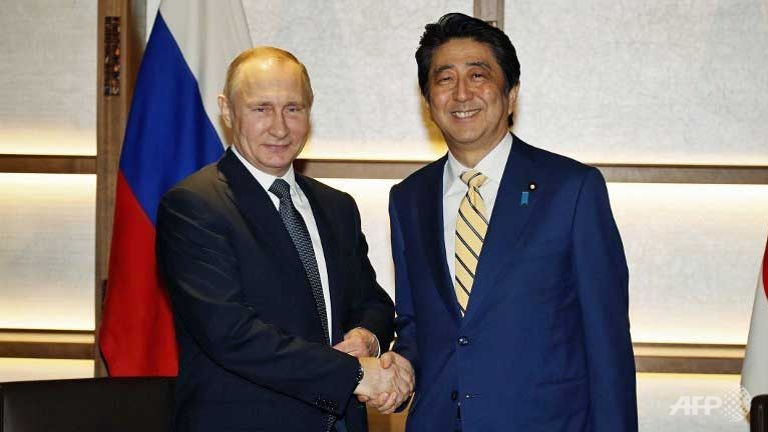 Putin, Abe ky vong hiep uoc hoa binh sau The chien II hinh anh