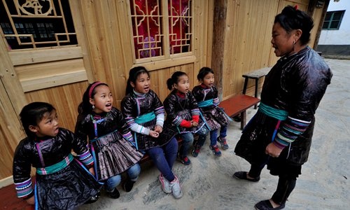 Lang co 'gieng than' giup sinh con theo y muon o Trung Quoc hinh anh