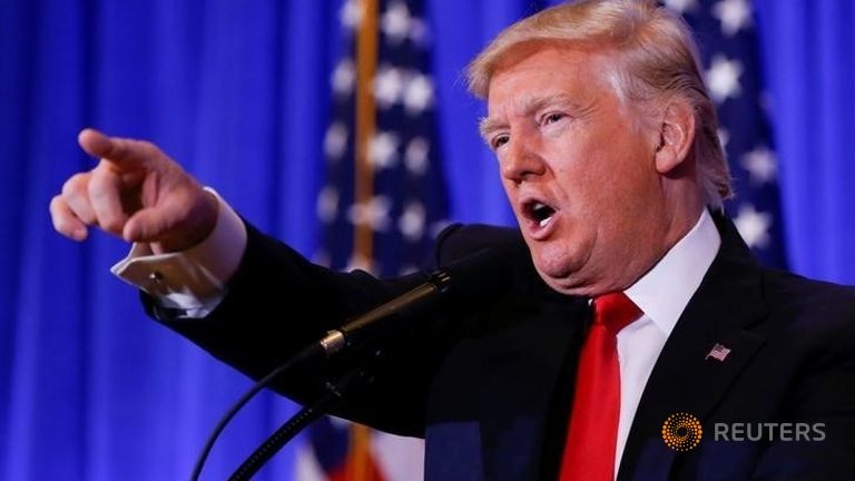 Nguoi bieu tinh len ke hoach pha roi le nham chuc cua Trump hinh anh