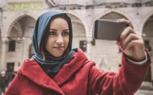 Chau A day manh du lich Hoi giao sau lenh cam cua Trump hinh anh