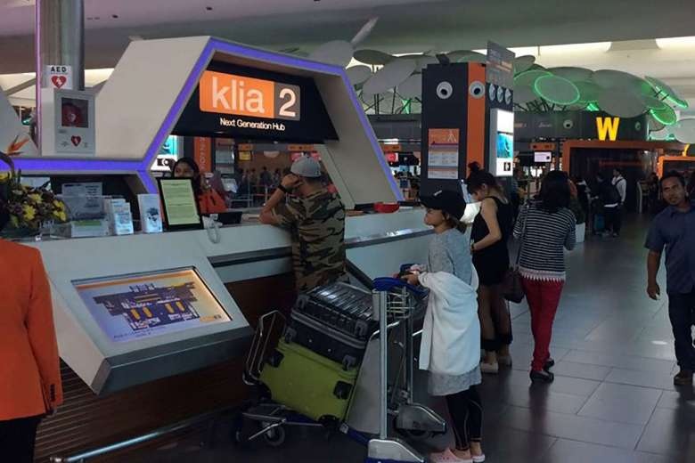 Malaysia tay doc san bay sau nghi an Kim Jong Nam hinh anh