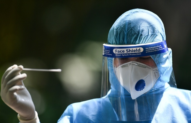 Dong Nai tang toc tiem vaccine ket hop xet nghiem sang loc hinh anh