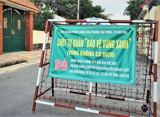 Dong Nai thong nhat chi mo cua vung xanh,  khoa chat vung do,  khoi phuc kinh te,  binh thuong moi anh 1